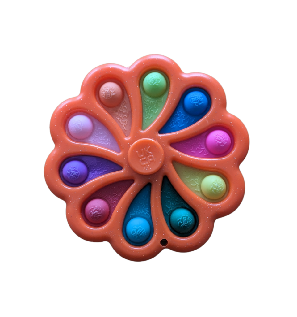 Jouet Fidget spinner et pop it en un, couleur orange et bulles de toutes les couleurs. Pour les enfants dans les transports.